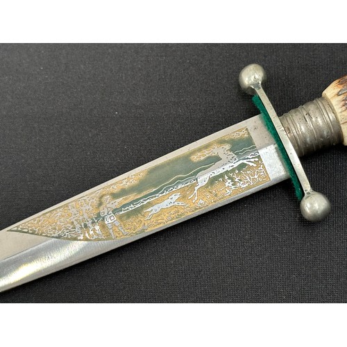 2298 - Hunting Knife with double edged blade 152mm in length with etched panel showing a Hunter with dog an... 