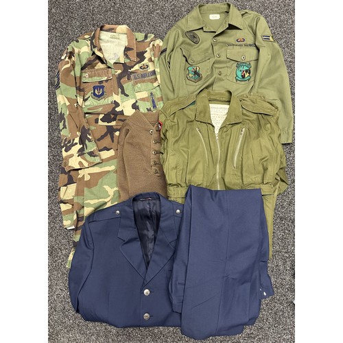 2304 - Collection of post war USAF uniforms to include: USAF Coat, Hot Weather, Woodland Camo pattern Comba... 