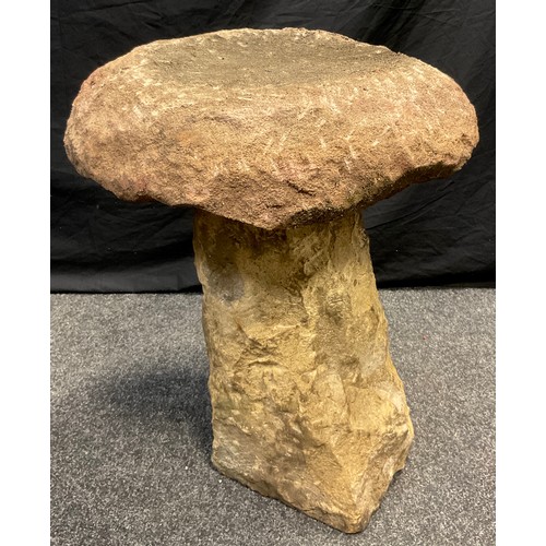28 - A Derbyshire Gritstone Staddle Stone, 62cm high x 46cm wide.