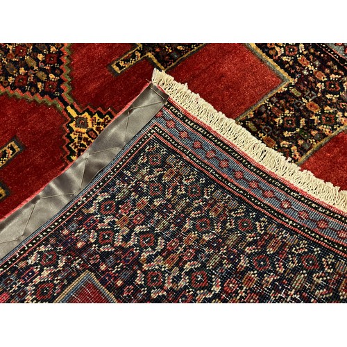 36 - A North West Persian Senneh runner carpet, 255cm x 78cm.