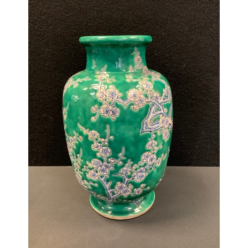 49 - A 20th century Chinese vase, blossoming prunus on green ground, mark to base, 31cm high