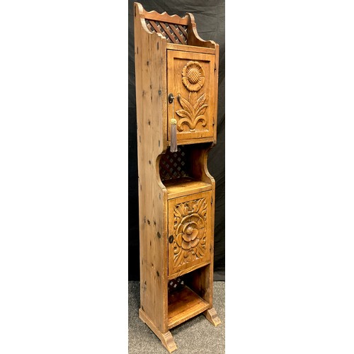 53 - A Country Farmhouse rustic pine niche-cupboard, three-quarter galleried top, over two small cupboard... 