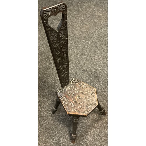 57 - A 19th century chip-carved spinning chair, turned legs, 93cm high;  19th century oak stool;  etc, (3... 