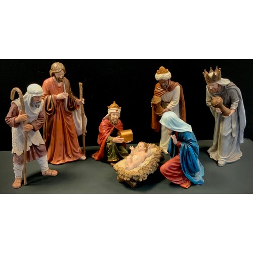 61 - A seven piece Holyart Nativity figure set, Jesus in the manger, Joseph, Mary, three kings etc, large... 