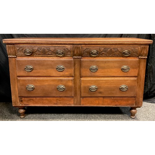 62 - A French walnut sideboard, six graduated drawers, the top pair with carved fronts, turned feet, 91.5... 