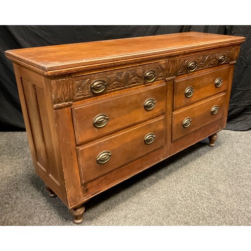 62 - A French walnut sideboard, six graduated drawers, the top pair with carved fronts, turned feet, 91.5... 