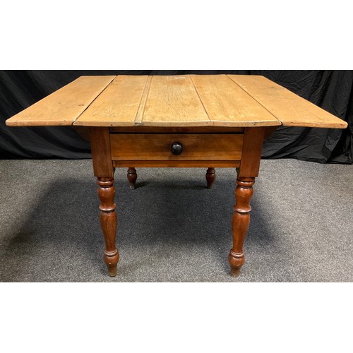 65 - A 19th century rustic pine-top Pembroke style kitchen table, five-plank top, on a mahogany base with... 