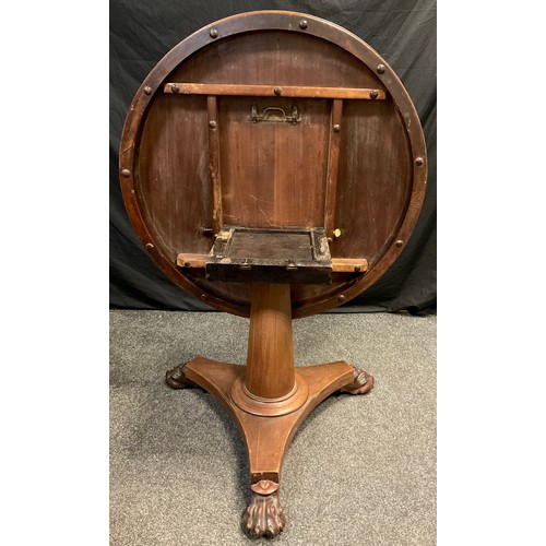 74 - A Victorian mahogany centre table, circular tilt-top, large tapered cylindrical pedestal, tri-form b... 