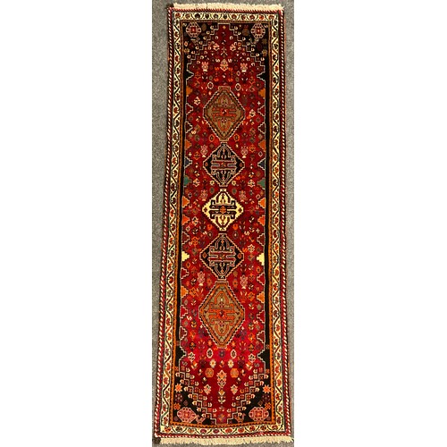 79 - A South West Persian Qashgai runner, 265cm x 70cm.