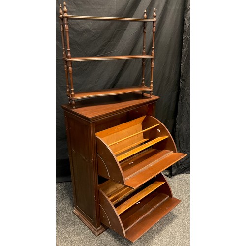 87 - A mahogany veneered two tier shoe rack, 92.5cm high x 66cm wide x 33cm deep;  a mahogany three tier ... 