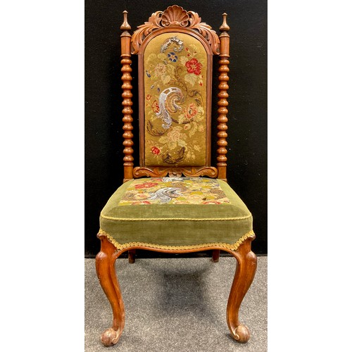 69 - A 19th century carved walnut chair, scallop cresting, bobbin turned spindles, cabriole legs, tapestr... 