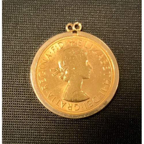 379 - An Elizabeth II sovereign, 9ct pendant mount, 1965, London mint, 9.1g gross