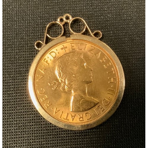 388 - An Elizabeth II sovereign, 9ct pendant mount, 1964, London mint, 9.3g gross