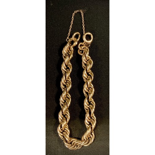 429 - A heavy weight 9ct gold twist link bracelet, 55g gross