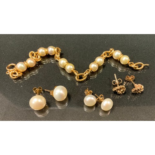 433 - A cultured pearl and yellow metal bracelet, indistinctly marked,10.3g gross;  pair of 9ct gold mount... 