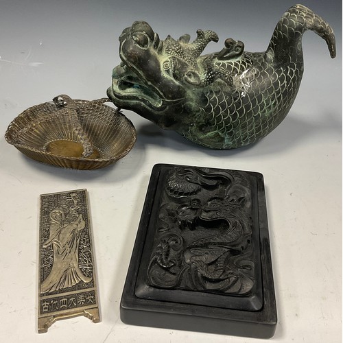 101 - A Japanese carved ink stone, 17cm x 11.5cm;  a reproduction Japanese bronze Dragon-fish kettle, 15.5... 