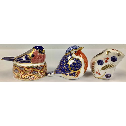 33 - A Royal Crown Derby paperweight, Bullfinch Nesting, gold stopper; others, Harvest Mouse, gold stoppe... 