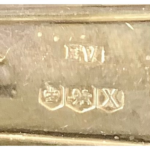 46 - A silver napkin ring, Birmingham 1975; other silver napkin rings; a Georgian silver mounted cut glas... 