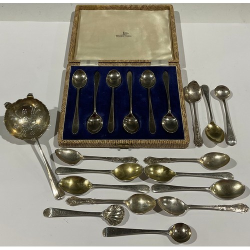 49 - A set of six silver teaspoons, Walker & Hall, Sheffield 1960, cased; a silver tea strainer, Sheffiel... 