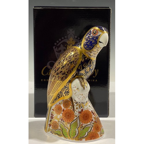 56 - A Royal Crown Derby paperweight, Bronze Winged Parrot, gold stopper, boxed