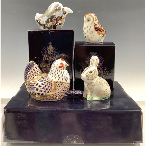 74 - A Royal Crown Derby paperweight, Owlet, gold stopper; others, Nibbles, gold stopper, boxed; Chicken,... 