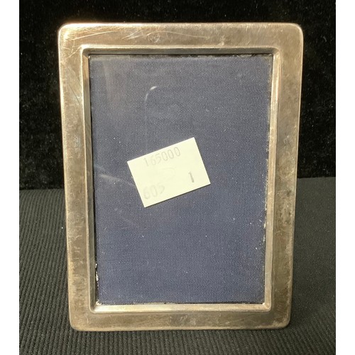 89 - An Elizabeth II silver rectangular easel photograph frame, Sheffield 1996