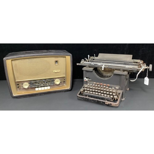 161 - A Murphy bakelite valve radio, mid 20th century; a Remington Standard typewriter (2)