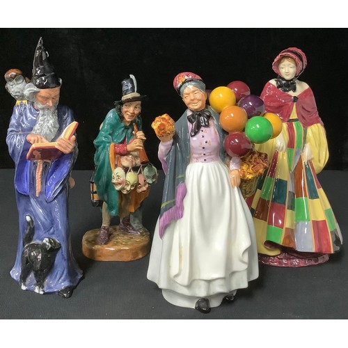 182 - A Royal Doulton figure, The Mask Seller, HN 2103; another, Biddy Penny Farthing, HN 1843; another, T... 