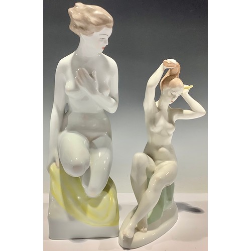 185 - A Hungarian Hollohaza figure, female nude, 30cm, faults; another Hungarian porcelain smaller nude fi... 