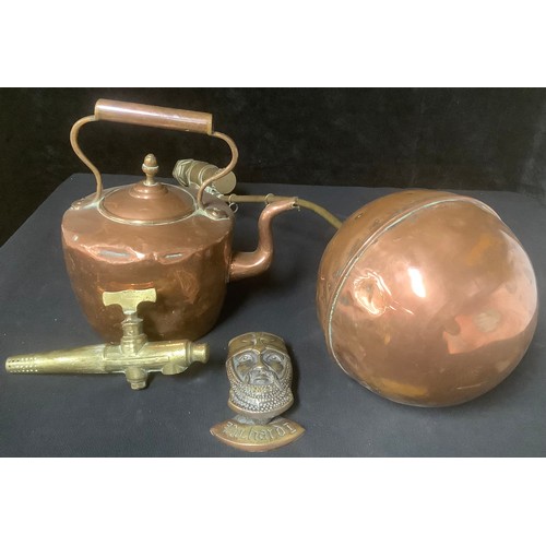 223 - A copper kettle, a copper ball cock, a brass tap; a brass Richard I door knocker (4)