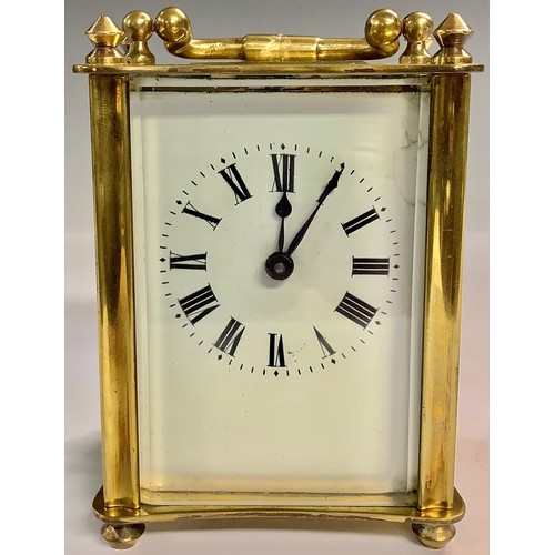 231 - An early 20th century French brass carriage clock, serpentine case, c.1900