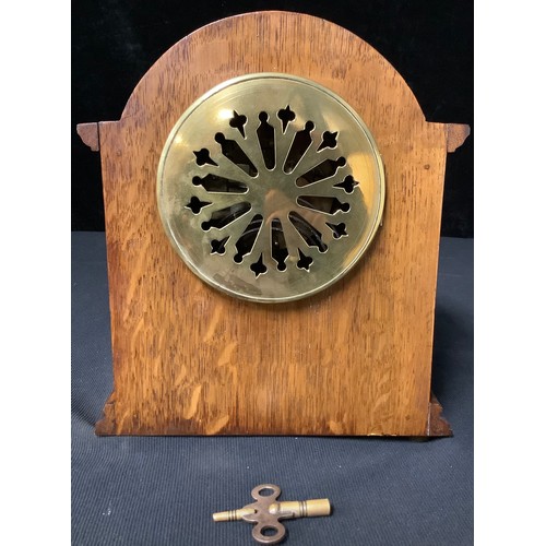 235 - An Edwardian oak and marquetry classical revival mantle clock, 8-day movement striking on a gong, c.... 