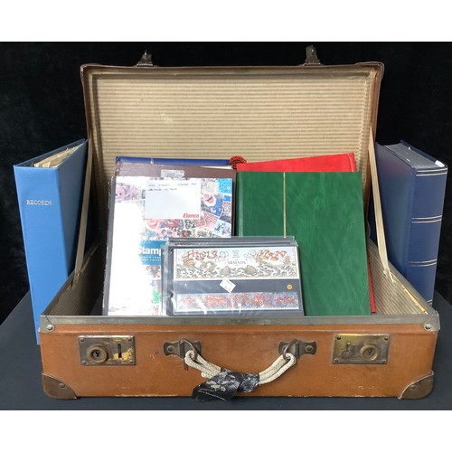 248 - Stamps - a quantity of stamp albums and binders, FDC, etc, thousands of stamps in two suitcases