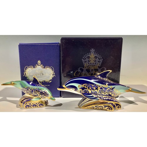 7 - A Royal Crown Derby paperweight, Bottlenose Dolphin, gold stopper, boxed; another, Baby Bottlenose D... 