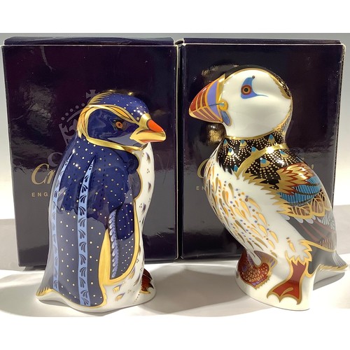 19 - A Royal Crown Derby paperweight, Rockhopper Penguin, 21st anniversary gold stopper, boxed; another, ... 
