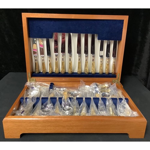 276 - Davenport & Sullivan, Sheffield cased canteen of silver-plated and parcel gilt 62 piece flatware set... 