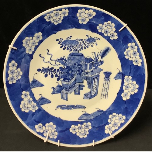 286 - A 19th century Chinese circular charger, decorated in tones of underglaze blue with Japanese ornamen... 