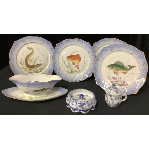 288 - A set of four Royal Copenhagen fish plates, each individually decorated, Perca fluviatilis, Cyprinus... 