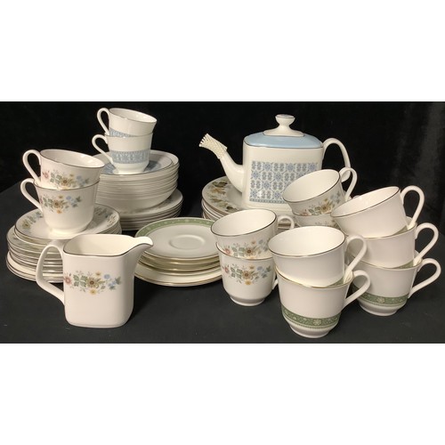 295 - A Royal Doulton Counterpoint pattern teapot, pair of cups and saucers, two dinner plates; a Royal Do... 