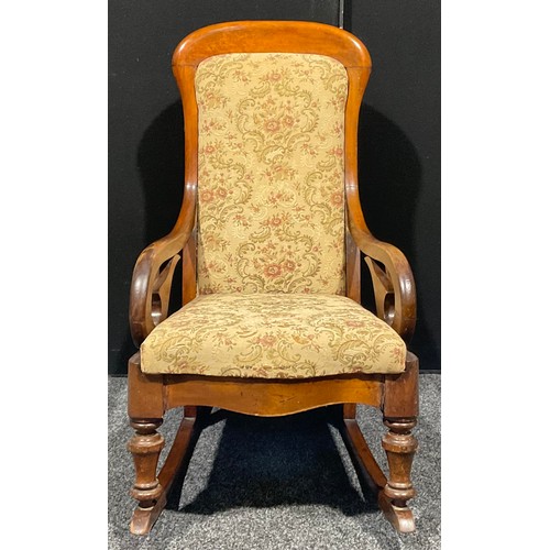 105 - A Victorian mahogany rocking chair, 101.5cm high, 53cm wide, 82cm deep, 49cm seat depth