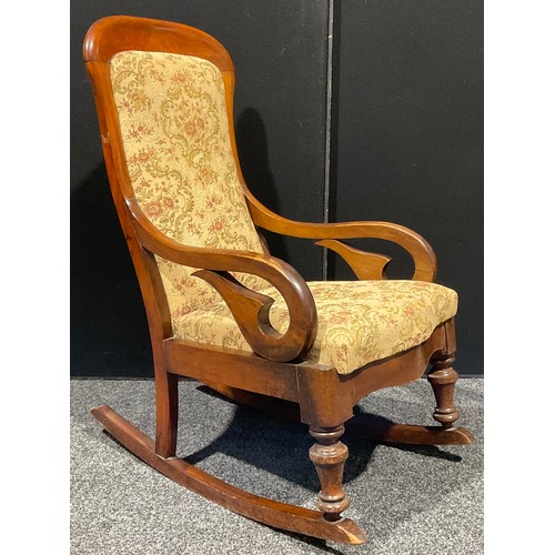 105 - A Victorian mahogany rocking chair, 101.5cm high, 53cm wide, 82cm deep, 49cm seat depth