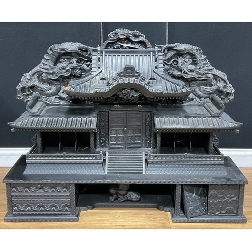 112 - A Chinese ebonised architectural pagoda-form table-top cabinet, 88.5cm high, 114cm wide, 33cm deep