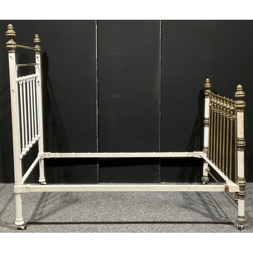 119 - A Victorian brass and iron bed, the headboard 182cm high, 141cm wide, c.1880