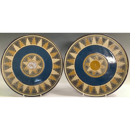 344 - A pair of Denby stoneware Boston Spa pattern chargers, 32cm diameters,