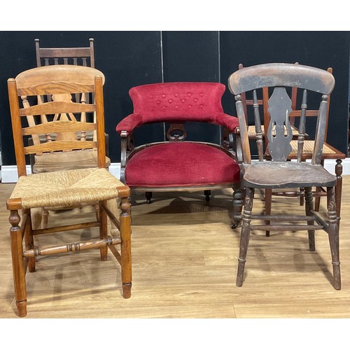 204 - A late Victorian/Edwardian mahogany club armchair; a pair of cane dining chairs, a ladder back dinin... 