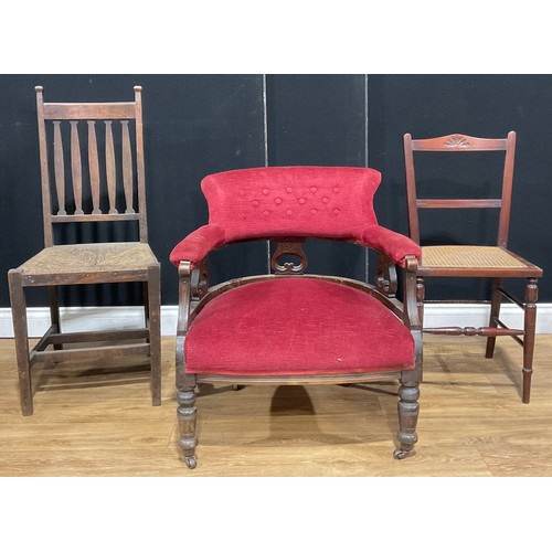 204 - A late Victorian/Edwardian mahogany club armchair; a pair of cane dining chairs, a ladder back dinin... 