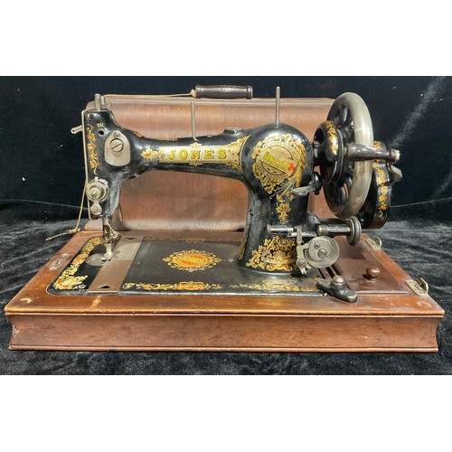 365 - A Jones hand cranked sewing machine, serial number 270930, early 20th century