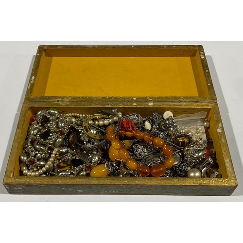 376 - Costume Jewellery - Earrings, bangles, necklaces etc in a gold painted and embossed wooden box