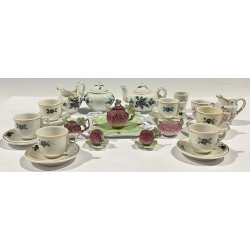 379 - A Victorian dolls tea set; a strawberry tea for two set