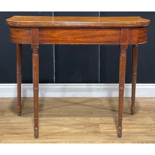 214 - A 19th century mahogany tea table, hinged top, ring-turned legs, 74cm high, 91.5cm wide, 45cm deep